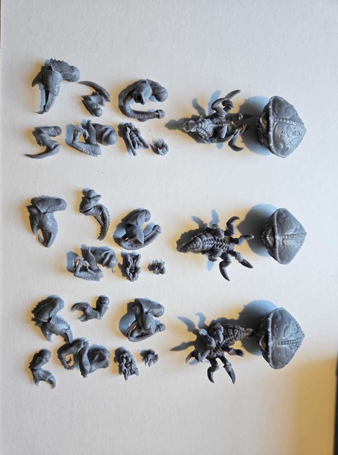 Unpainted Crab Guard miniatures with various weapon options for tabletop wargaming, compatible with GrimDark and OPR.